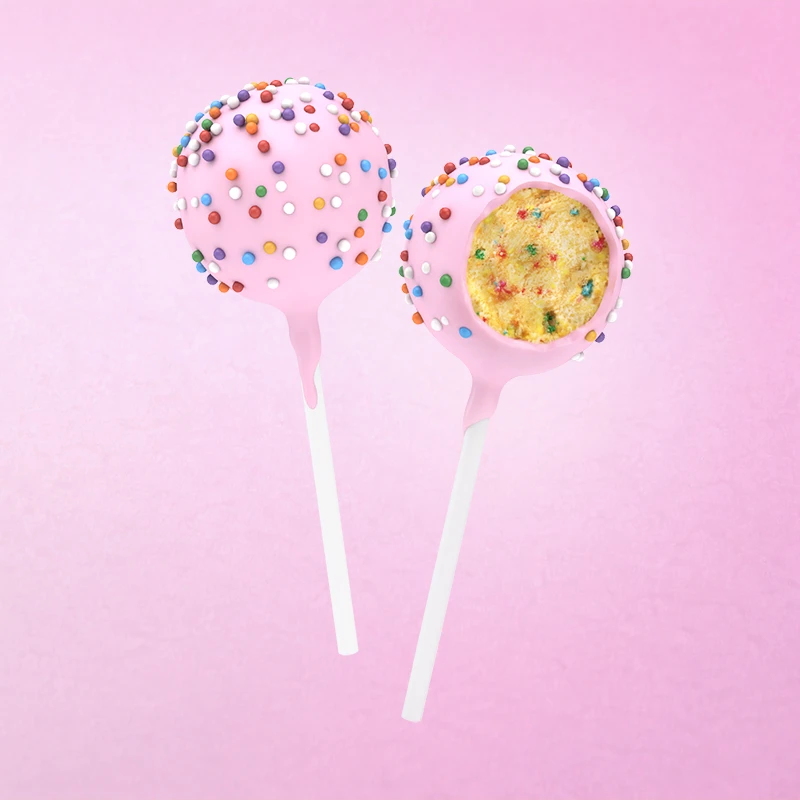 A buttery rich birthday cake with bits of sprinkles frosted with white chocolate.